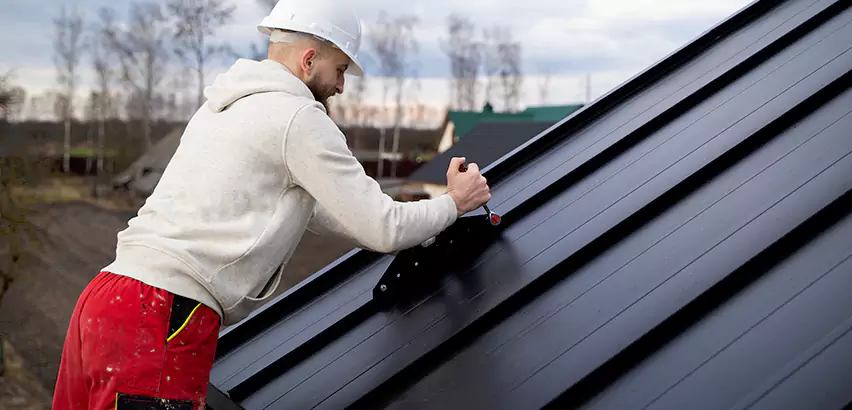 Tin Roof Ridge Cap Installation in Edgewood